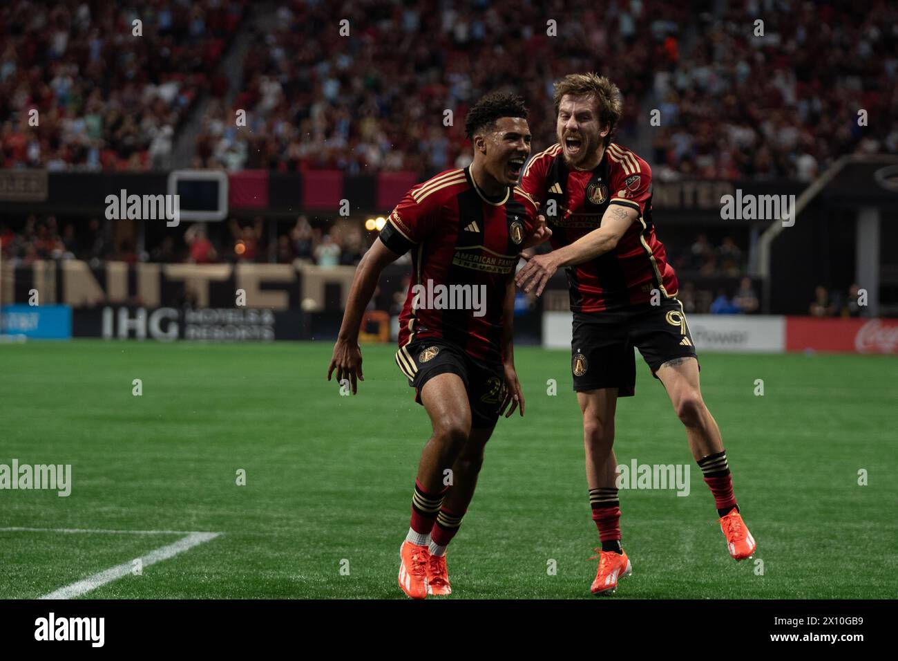 Atlanta, Georgia, USA. 14th Apr, 2024. Caleb Wiley 63' goal celebrating with Saba Lobjanidze (Credit Image: © Andrew Clark/ZUMA Press Wire) EDITORIAL USAGE ONLY! Not for Commercial USAGE! Stock Photo