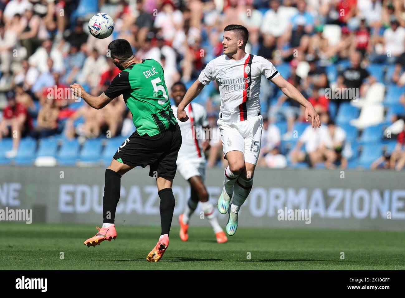 Luka Jovic (Milan)Martin Erlic (Sassuolo) during the Italian 'Serie A' match between Sassuolo 3-3 Milan at Mapei Stadium on April 14, 2024 in Reggio Emilia, Italy. Credit: Maurizio Borsari/AFLO/Alamy Live News Stock Photo