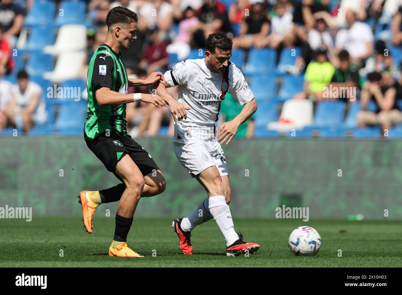 Daniel Boloca (Sassuolo)Alessandro Florenzi (Milan) during the Italian 'Serie A' match between Sassuolo 3-3 Milan at Mapei Stadium on April 14, 2024 in Reggio Emilia, Italy. Credit: Maurizio Borsari/AFLO/Alamy Live News Stock Photo