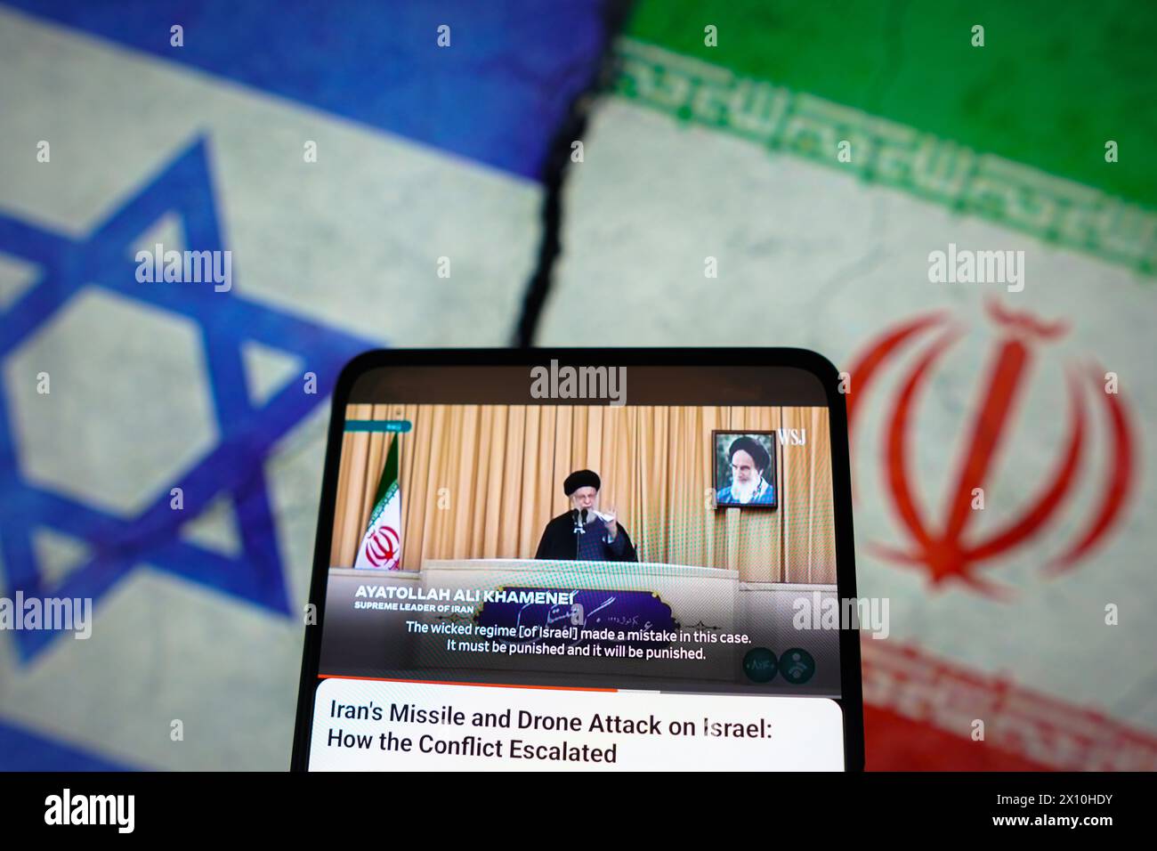 Brazil. 14th Apr, 2024. In this photo illustration, the Ayatollah Seyed Ali Khamenei, Supreme Leader of Iran, appears talking about the war between Iran and Israel, in a video from the Wall Street Journal on a smartphone screen. (Photo by Rafael Henrique/SOPA Images/Sipa USA) *** Strictly for editorial news purposes only *** Credit: Sipa USA/Alamy Live News Stock Photo