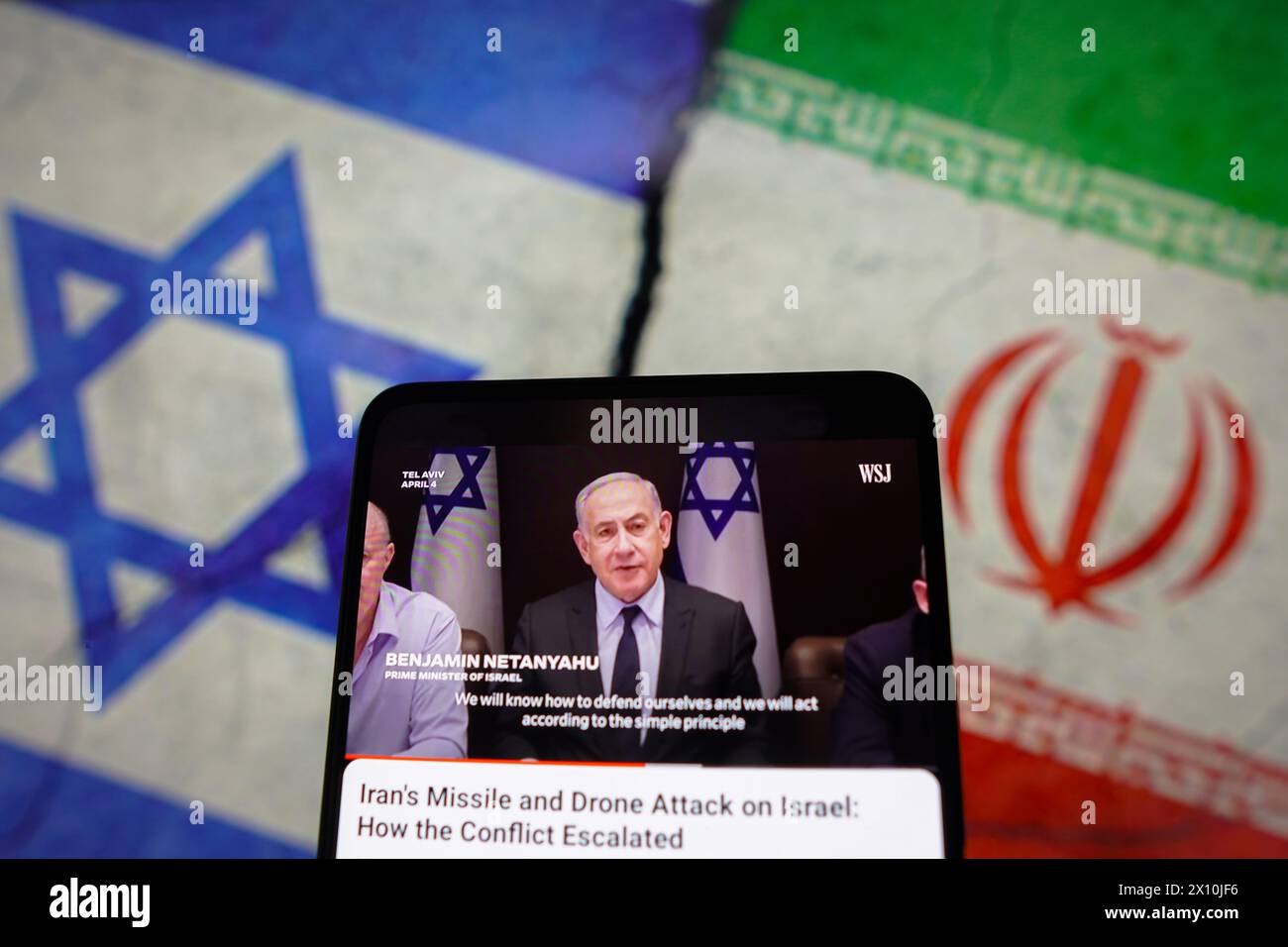 Brazil. 14th Apr, 2024. In this photo illustration, the Prime Minister of Israel, Benjamin Netanyahu appears talking about the war between Iran and Israel, in a video from the Wall Street Journal on a smartphone screen. (Credit Image: © Rafael Henrique/SOPA Images via ZUMA Press Wire) EDITORIAL USAGE ONLY! Not for Commercial USAGE! Stock Photo