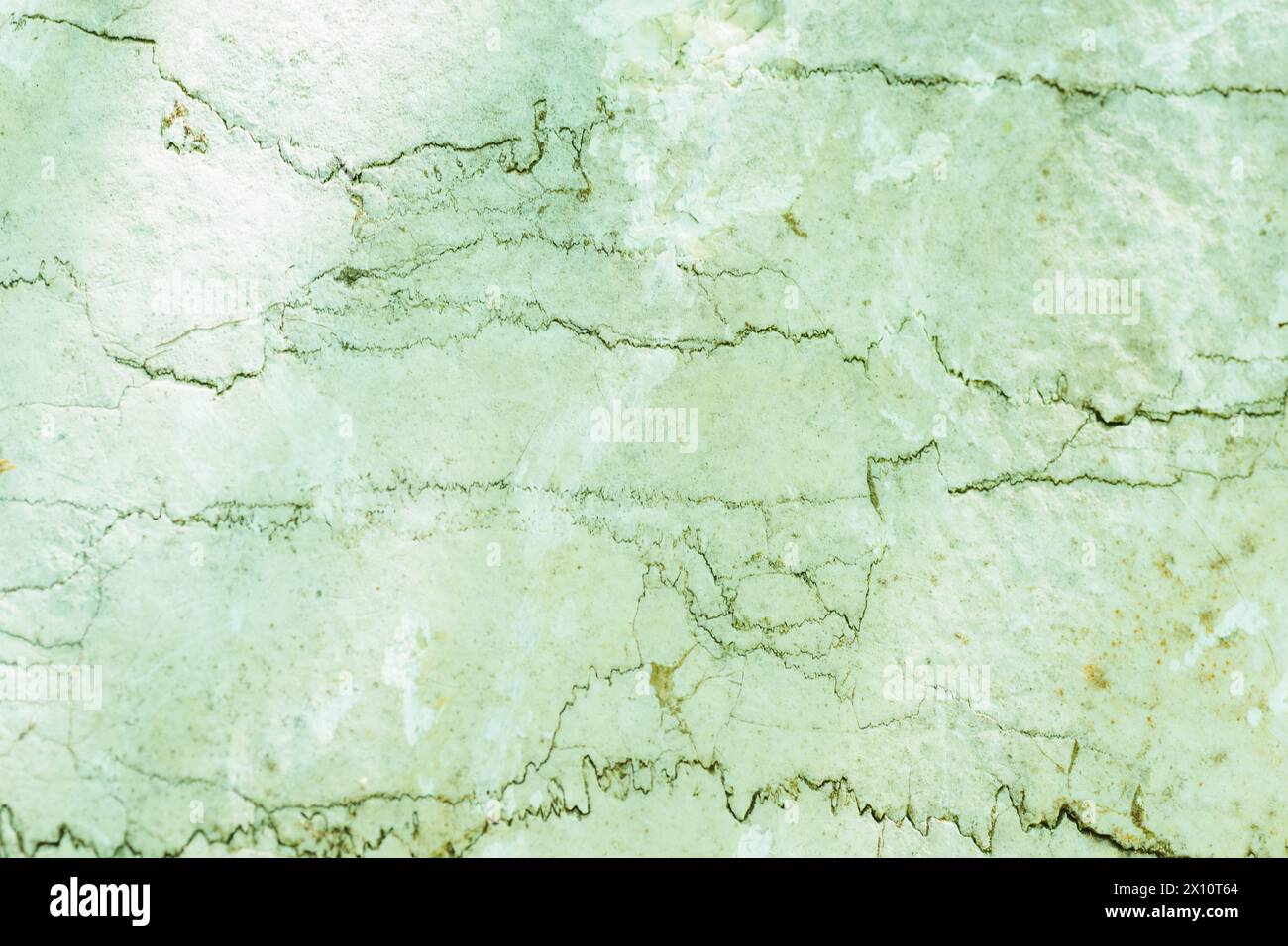 White stone with cracks. Background texture. Stock Photo