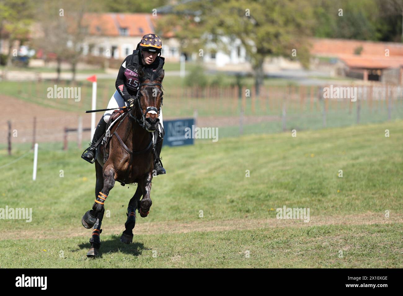Burnham Market, Norfolk, UK. 14th Apr, 2024. Tom Bird of Great Britain with COWLING HOT GOSSIP during the CCI4*-S cross country at the Burnham Market International Horse Trials on April 14, 2024, Burnham Market, United Kingdom (Photo by Maxime David - MXIMD Pictures) Credit: MXIMD Pictures/Alamy Live News Stock Photo