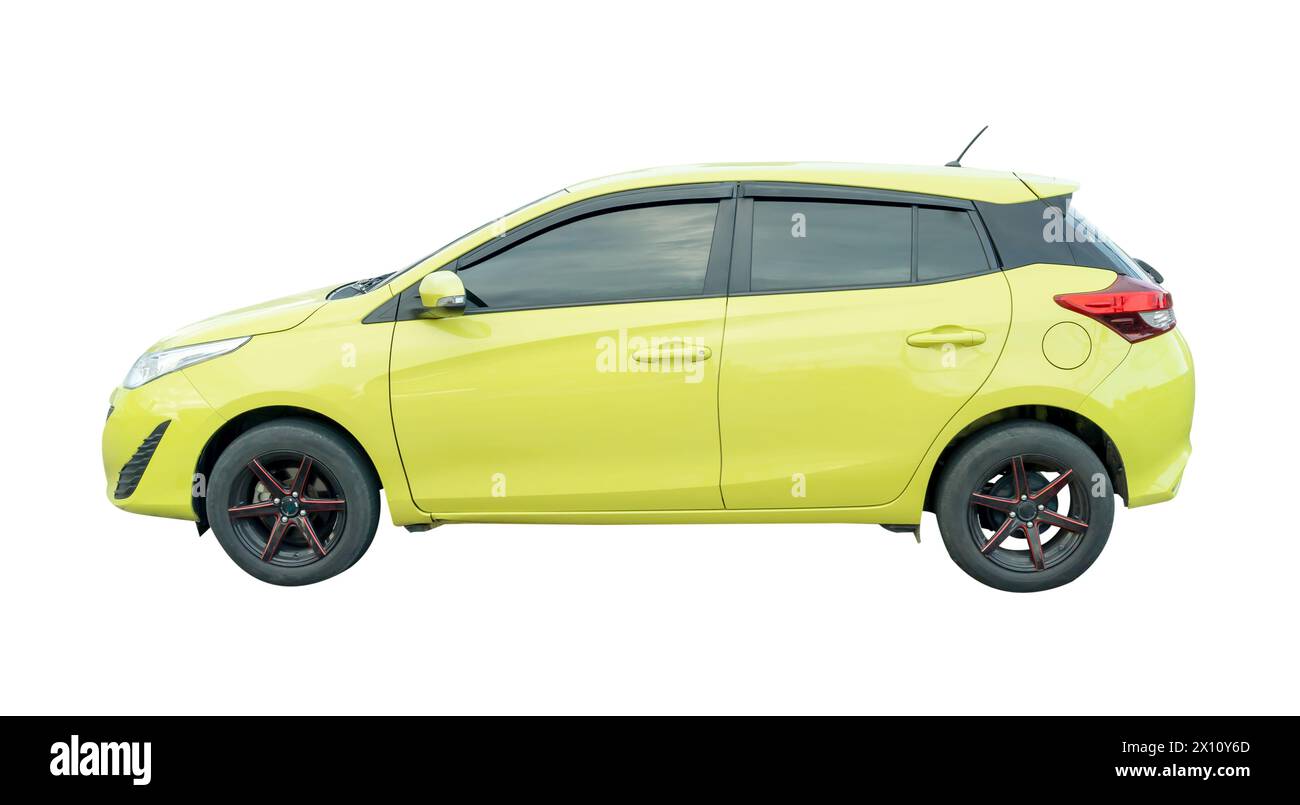 Side view of beautiful light green hatchback car is isolated on white background with clipping path. Stock Photo