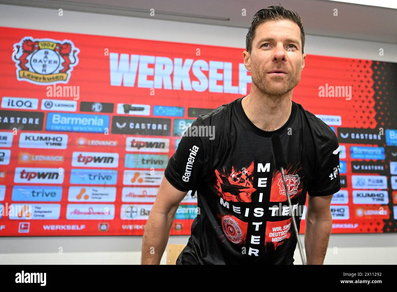 Leverkusen, Germany. 14th Apr, 2024. Xabi Alonso, head coach of Bayer 04 Leverkusen, attends a press conference after they won the first division of Bundesliga match between Bayer 04 Leverkusen and SV Werder Bremen in Leverkusen, Germany, April 14, 2024. Credit: Ulrich Hufnagel/Xinhua/Alamy Live News Stock Photo