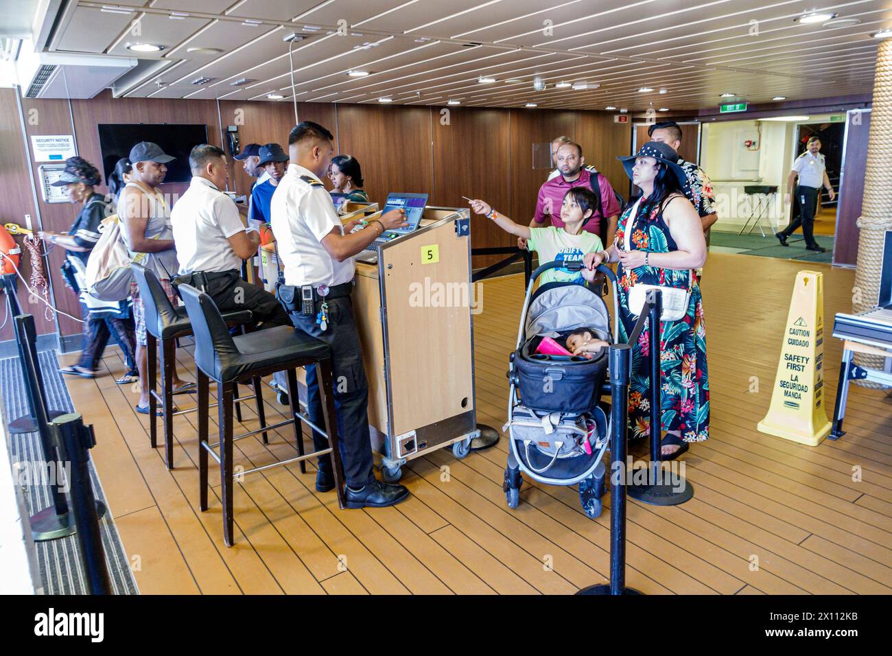 Costa Maya Mexico,Cruise Port,Norwegian Joy Cruise Line ship,7-day Caribbean Sea itinerary,onboard inside interior,security staff checking ID identity Stock Photo