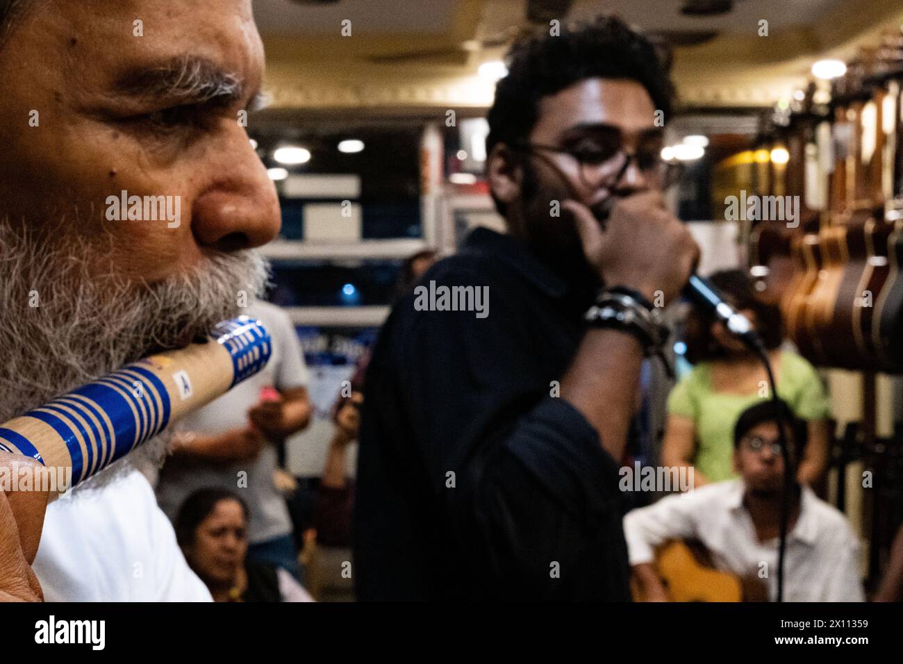 Kolkata, India. 14th Apr, 2024. Several new Bengali musical band have been emerging this year. A new revolution can be seen in Bengali band music based on changing the taste music in young generation has been emerging. A new Bengali psycodelic bule based band names 'The Mahanagar' releases its first song in local music instrument store. Pradip Chatterjee (Bulada), a member of 'Mohiner Ghoraguli' (One of the oldest music band based in Kolkata) also present in this event. (Photo by Swattik Jana/Pacific Press) Credit: Pacific Press Media Production Corp./Alamy Live News Stock Photo
