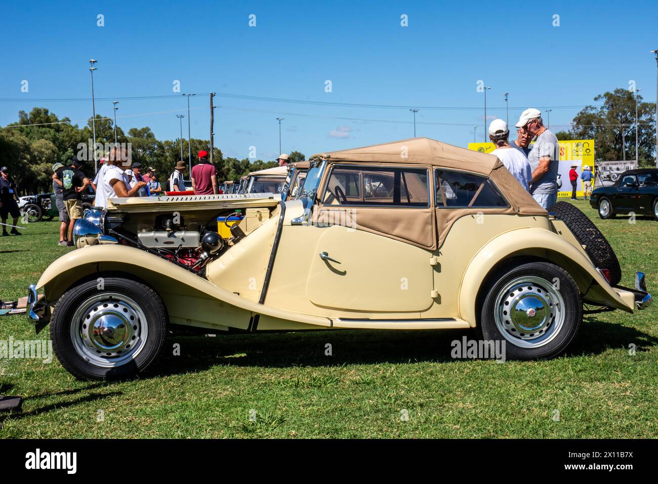 Side view of an MG T type sports car on display at the 2024 Centenary