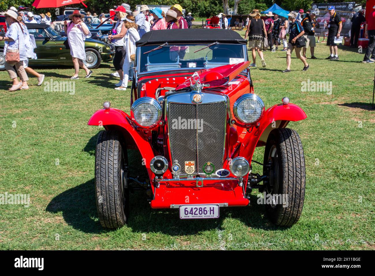 Front view of an MG T type sports car on display at the 2024 Centenary