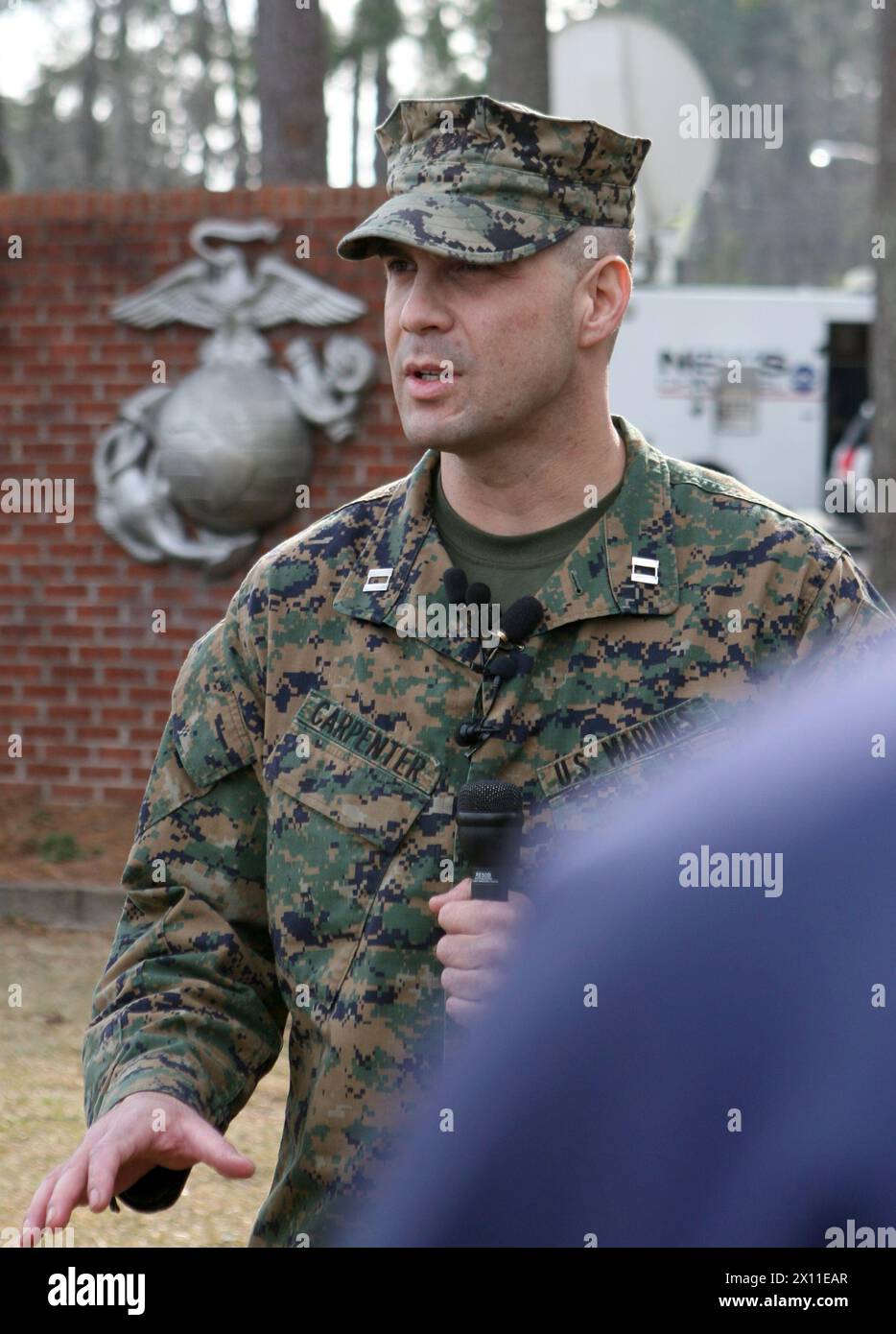 Capt. Clark Carpenter, the Public Affairs Officer with the 22nd Marine Expeditionary Unit, discusses the impending deployment of the 22nd MEU in support of earthquake relief operations in Haiti Jan. 14, 2010 aboard Camp Lejeune, N.C. Stock Photo