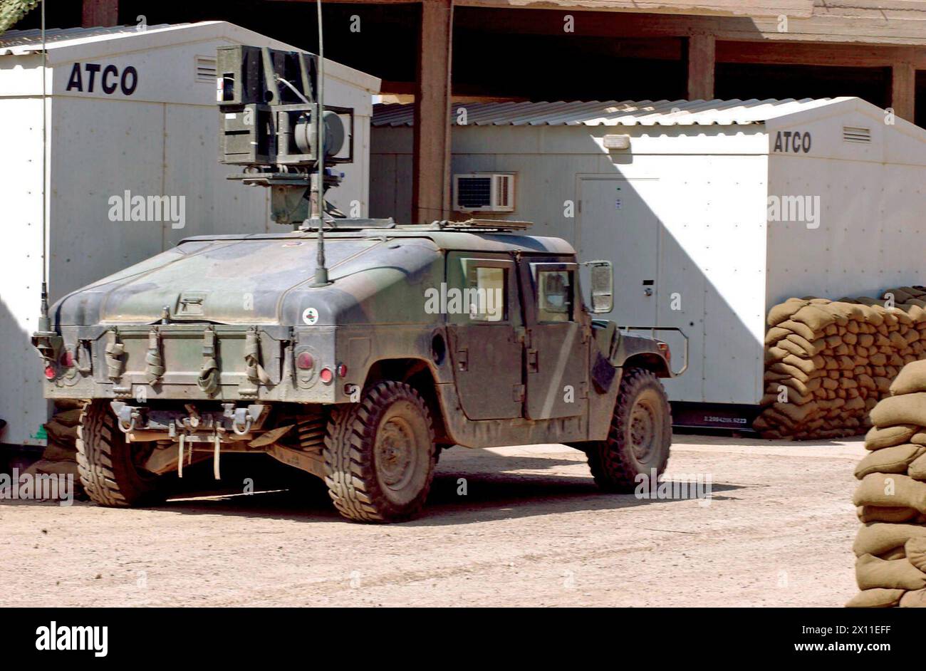 The distinct loud speaker mounted to the top of their vehicle, part of the mission of a Tactical Psychological Operations Team is to broadcast pre-recorded and live messages to an area they patrol ca. April 05, 2004 Stock Photo