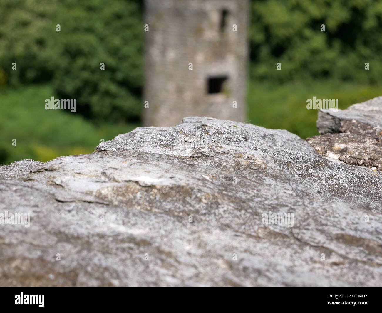 Old stone over ancient tower background, Blarney castle in Ireland, old ancient celtic fortress Stock Photo