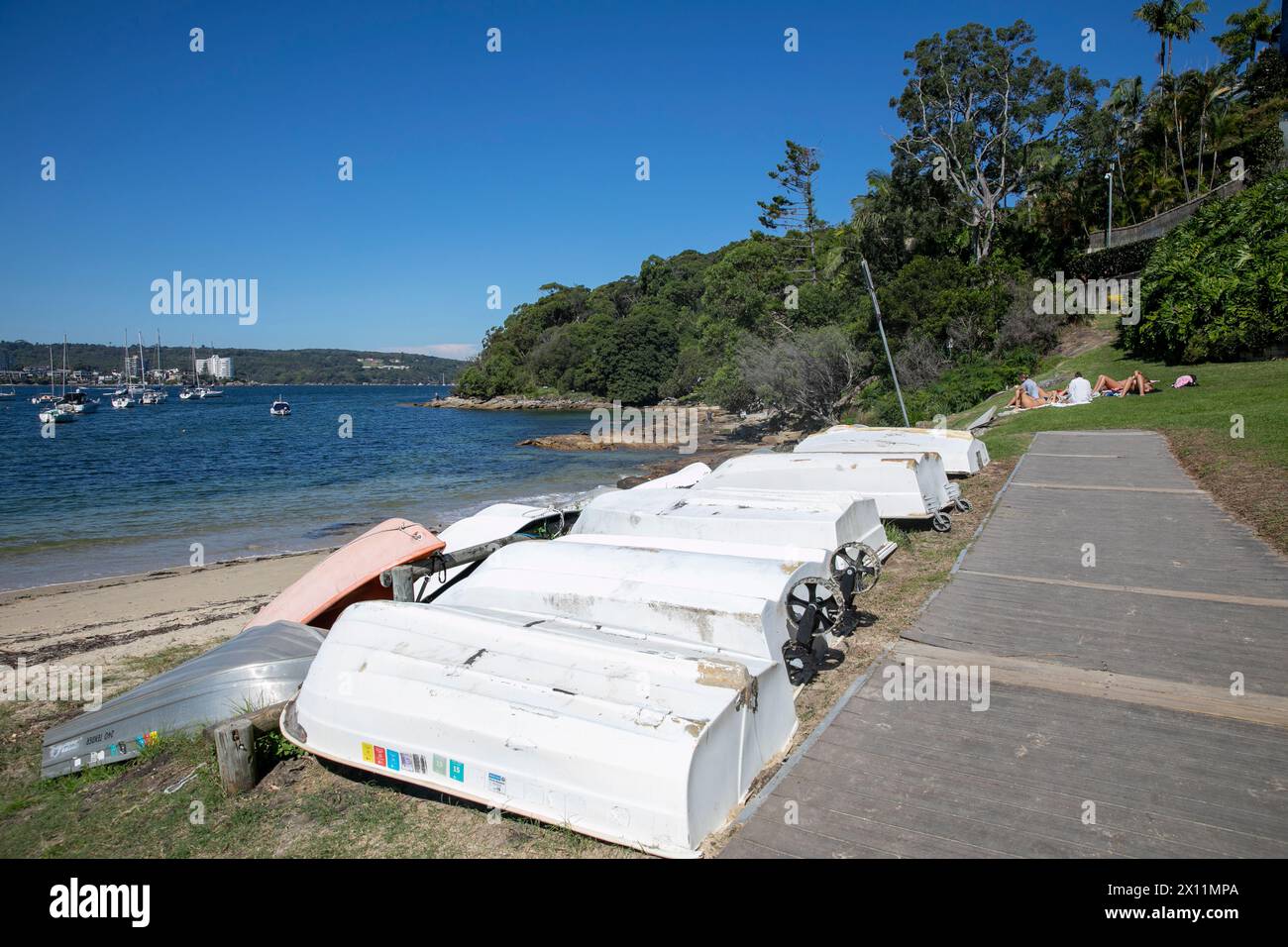 Forty Baskets beach and reserve, with yachts moored in middle harbour and dinghies stored on the beach,Sydney,NSW,Australia Stock Photo