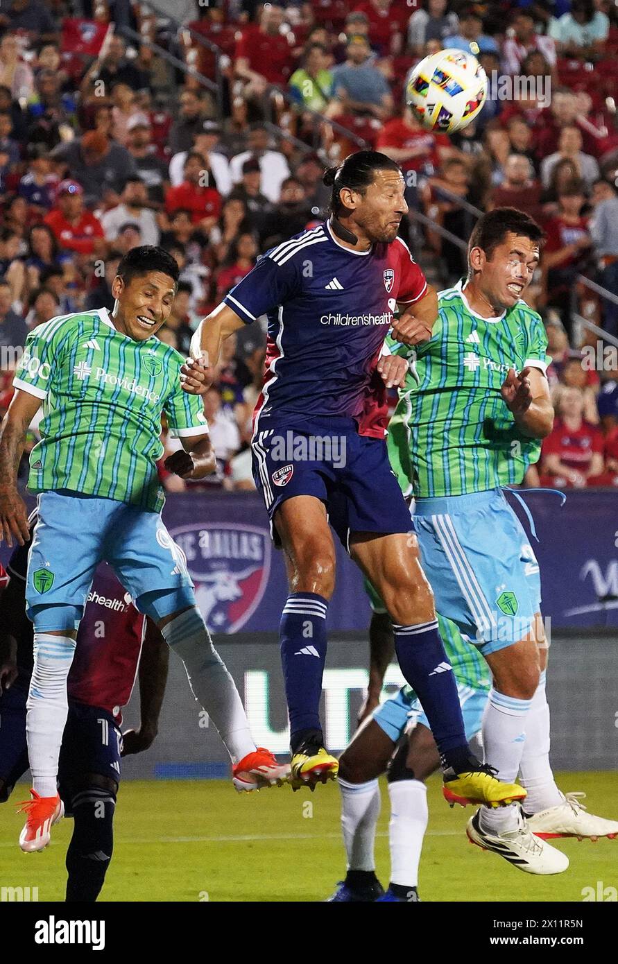 Frisco, Texas, USA. 13th Apr, 2024. Frisco, Texas, USA: Dallas defender Omar Gonzalez #3 hits the header between Seattle players Raul Ruidiaz #9 and Jackson Ragen #25 during the Major League Soccer match between FC Dallas and Seattle Sounders played at Toyota Stadium. Final result 0-0 (Credit Image: © Javier Vicencio/eyepix via ZUMA Press Wire) EDITORIAL USAGE ONLY! Not for Commercial USAGE! Stock Photo