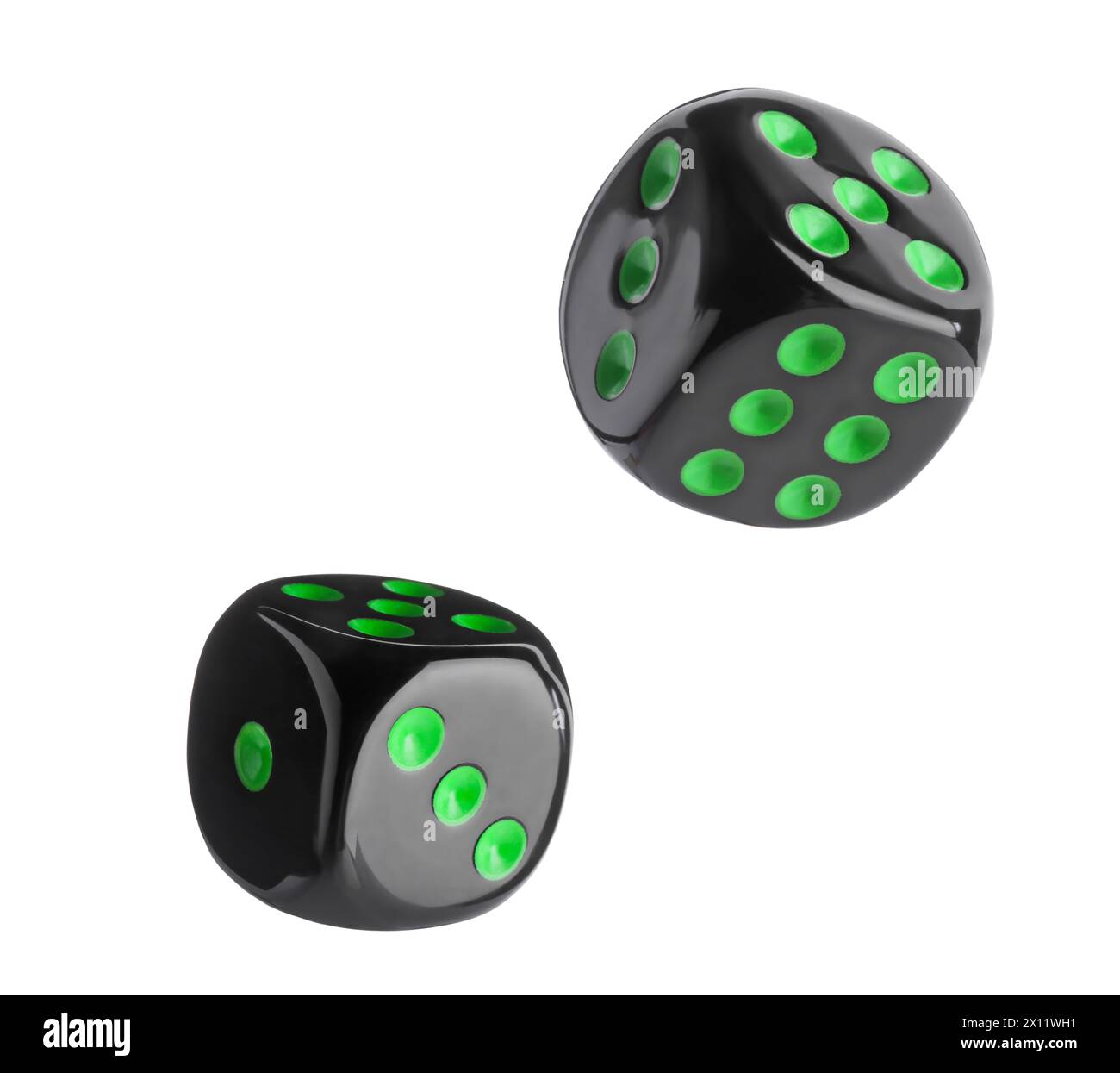 Two black dice in air on white background Stock Photo