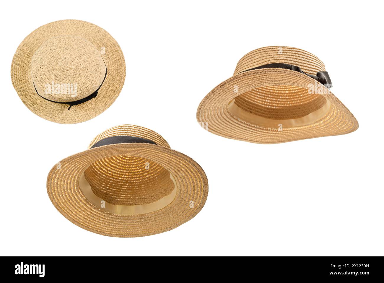 Straw hat with black bow isolated on white background. Stock Photo