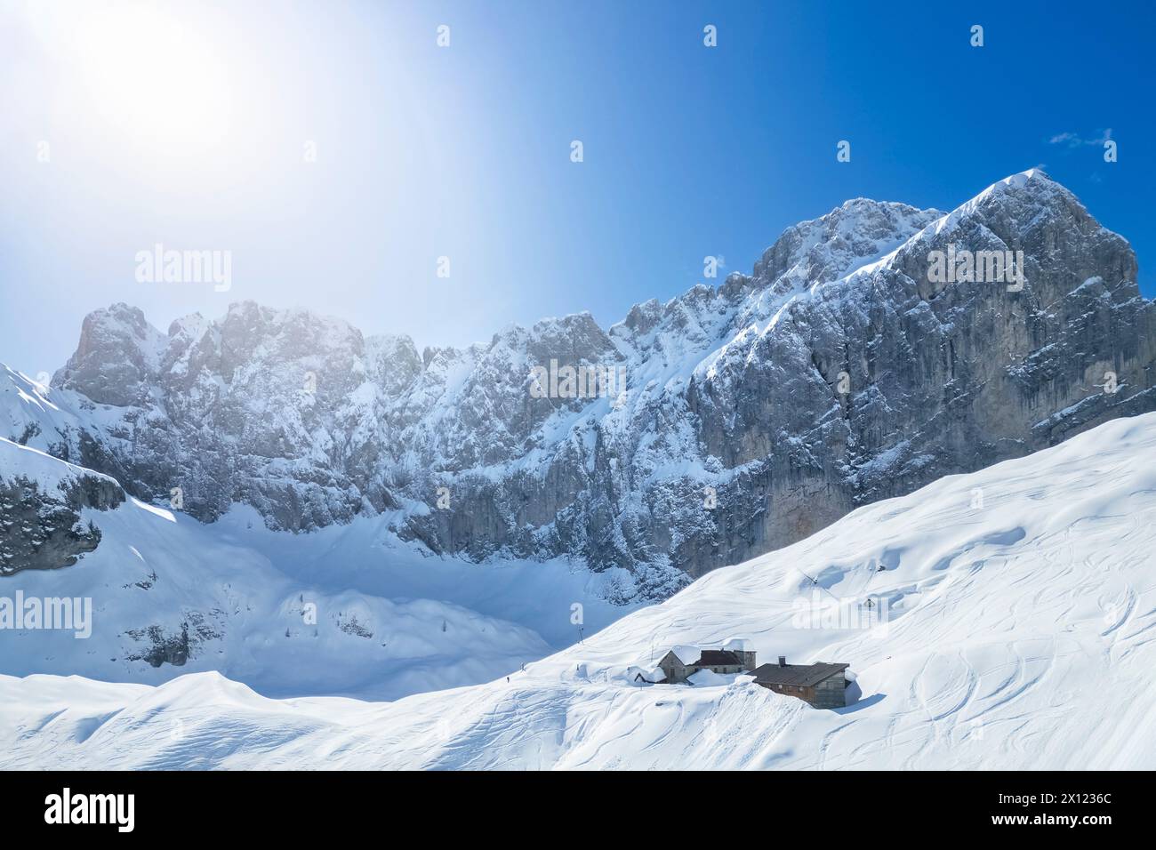 Aerial view of the Albani refuge and the north face of the Presolana in winter. Val di Scalve, Bergamo district, Lombardy, Italy, Southern Europe. Stock Photo