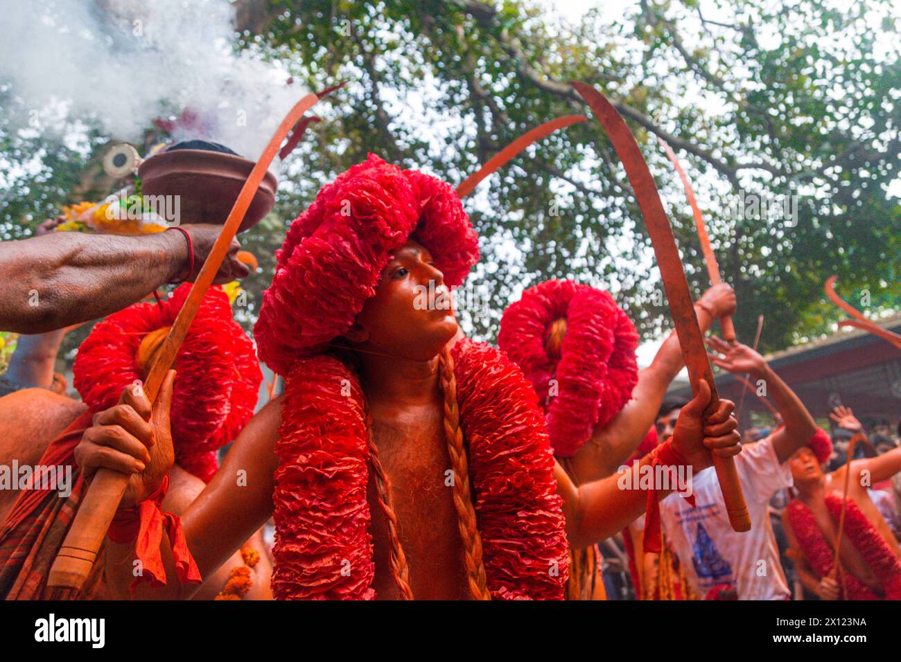 Hindu devotees seen dancing with their swords while celebrating Lal