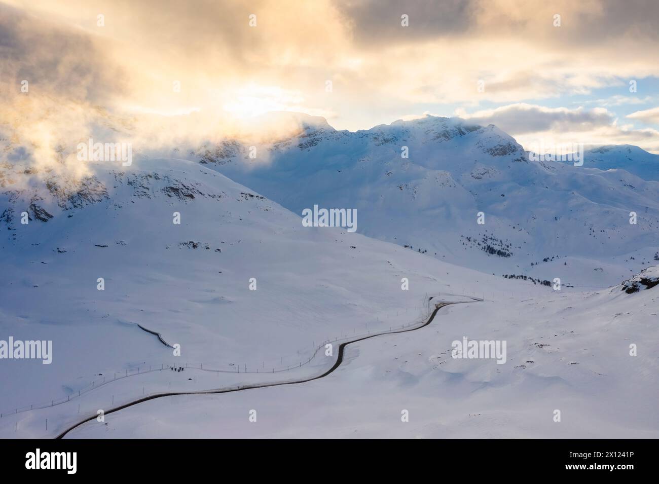 Aerial view of the frozen lakes and mountains at Bernina pass, Graubunden, Engadin, Switzerland. Stock Photo