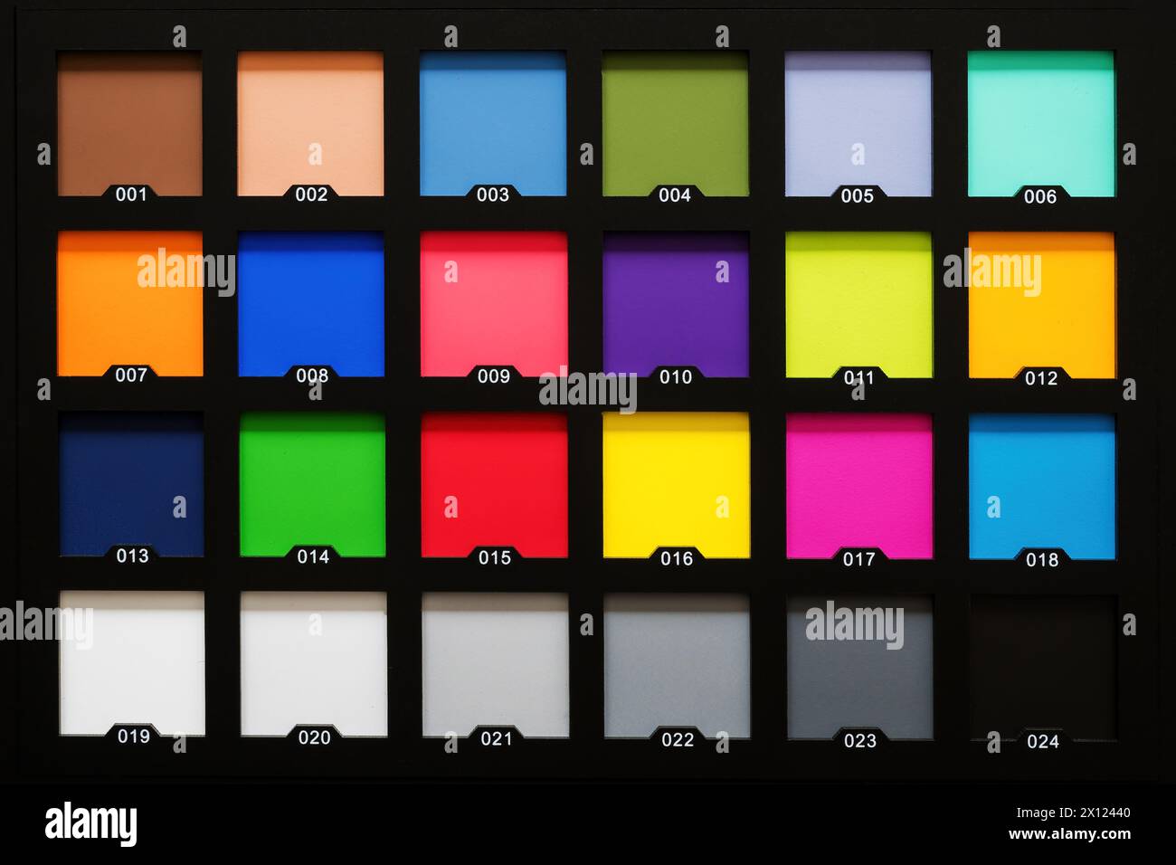Color checker passport used for white balance and accurate color calibration by photographers, top view Stock Photo