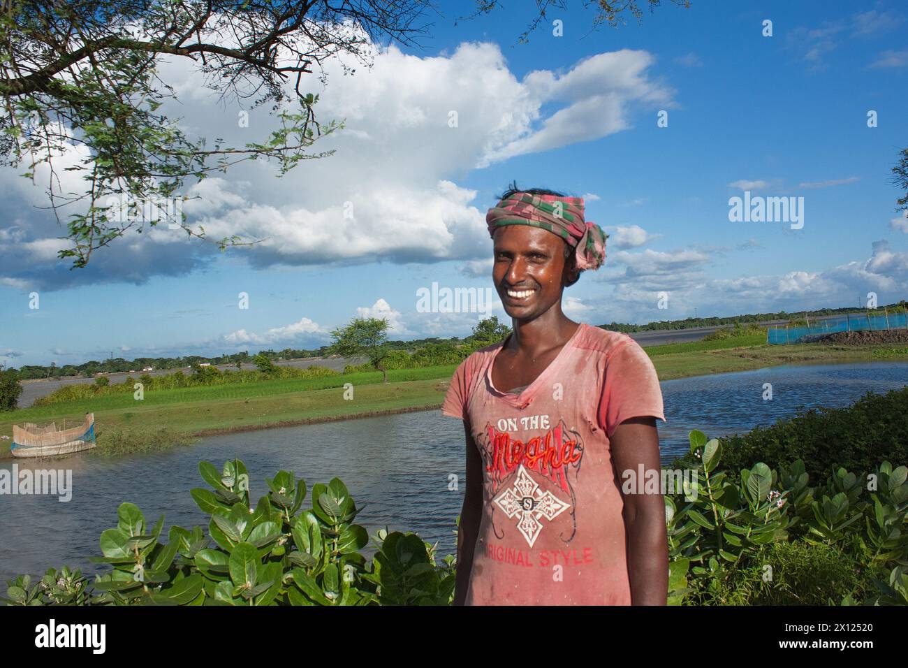 A happy farmer with a smile. Khulna, Bangladesh. Stock Photo