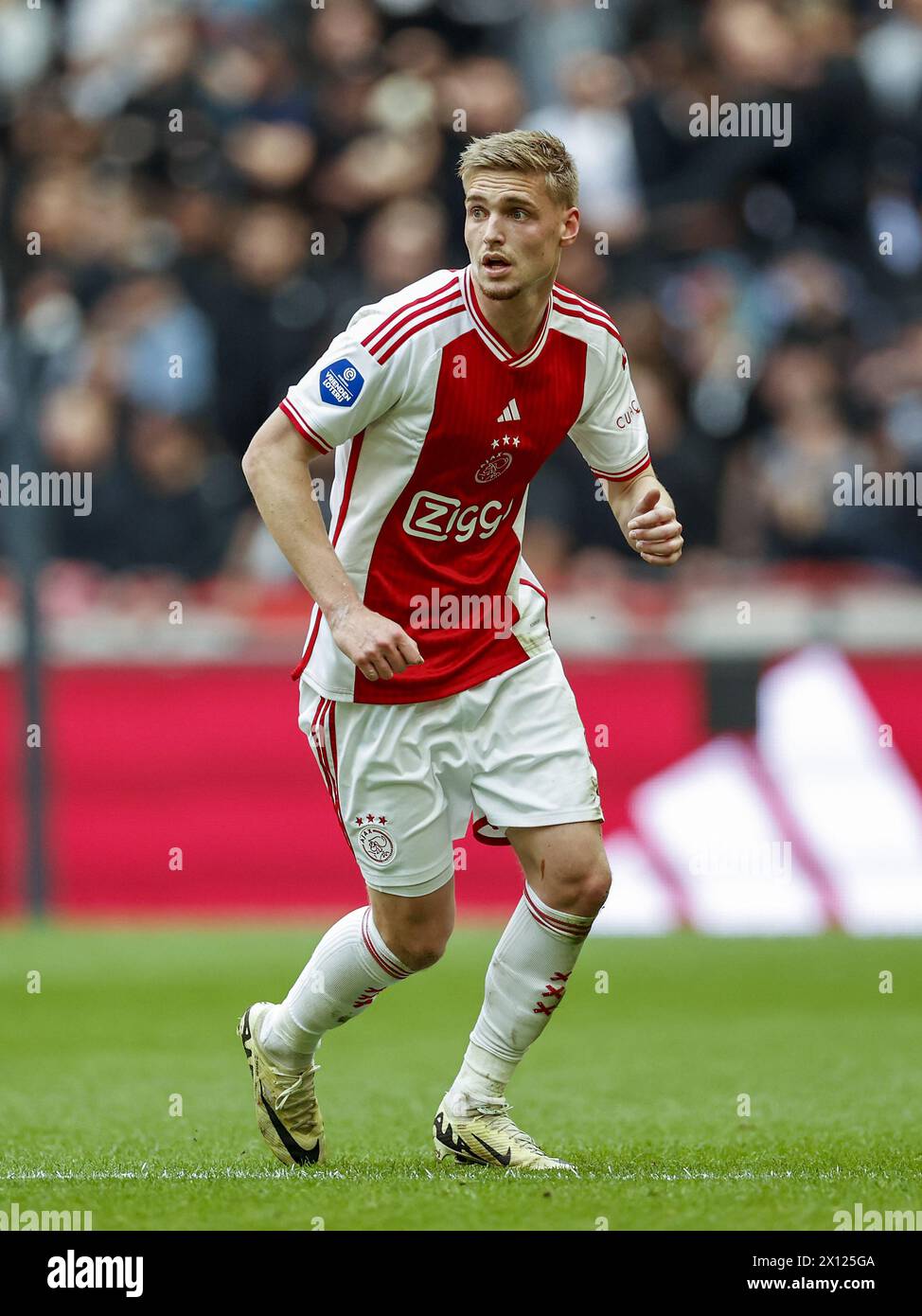 AMSTERDAM - Kenneth Taylor of Ajax during the Dutch Eredivisie match between Ajax Amsterdam and FC Twente at the Johan Cruijff ArenA on April 14, 2024 in Amsterdam, Netherlands. ANP | Hollandse Hoogte | MAURICE VAN STEEN Stock Photo