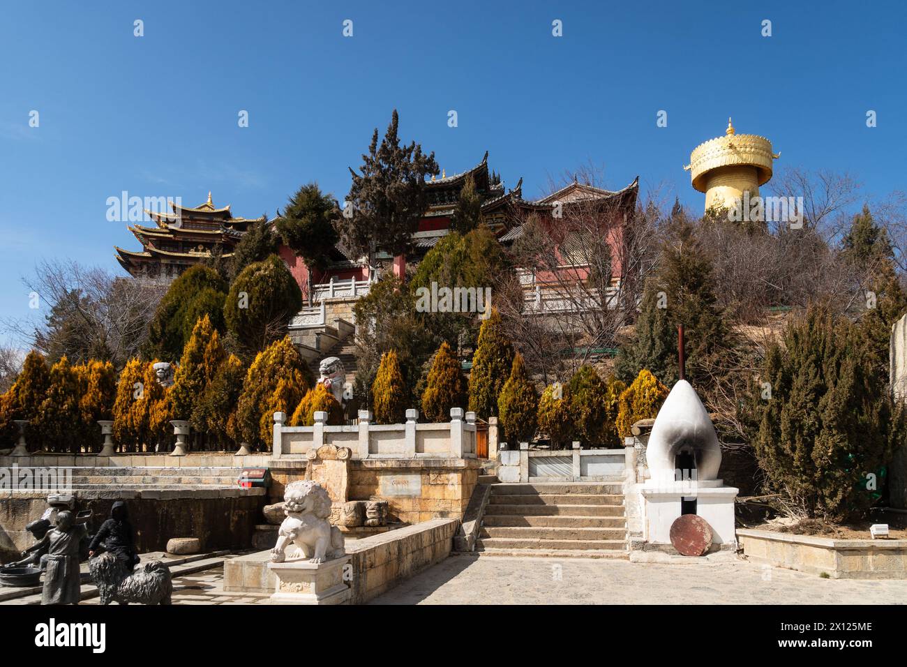 Zhongdian, China: Tibetan Buddhism monastery in the city of Zhongdian in the Himalayas in the Yunnan province on a sunny winter day in China Stock Photo