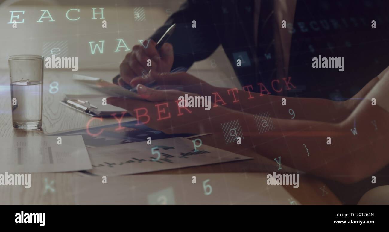 Digital composite of business people working on a tablet and codes in the foreground Stock Photo