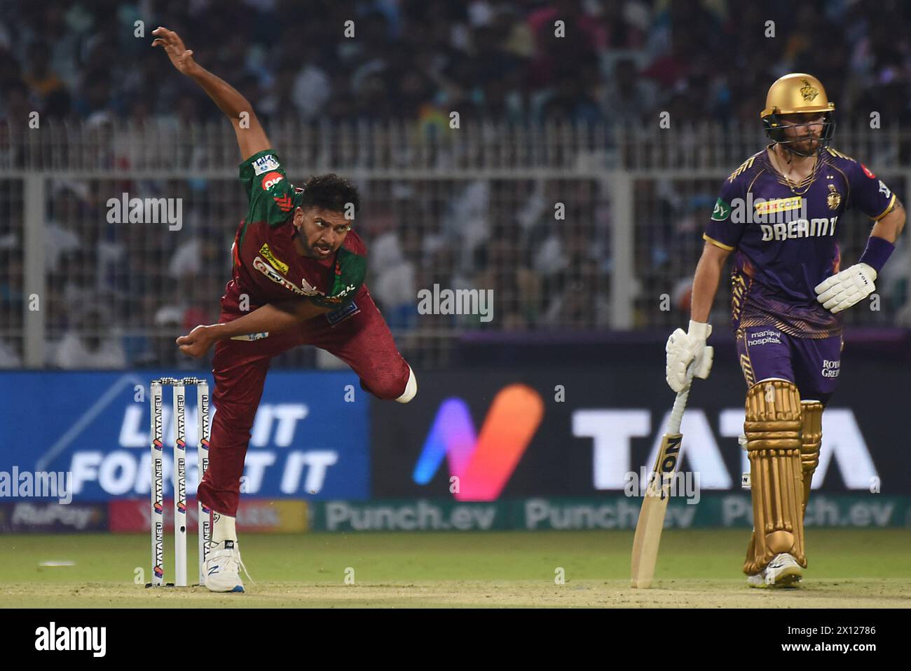 Lucknow Super Giants' Mohsin Khan delivers a ball  during the Indian Premier League (IPL) Twenty 20 cricket match between Kolkata Knight Riders and Lucknow Super Giants at the Eden GardensKolkata Knight Riders beat Lucknow Super Giants by 8 wickets Stock Photo