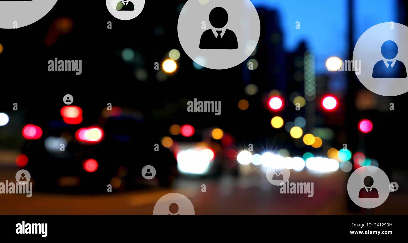 Image of profile icons over blurred vehicles stopped on red signal in street of city Stock Photo