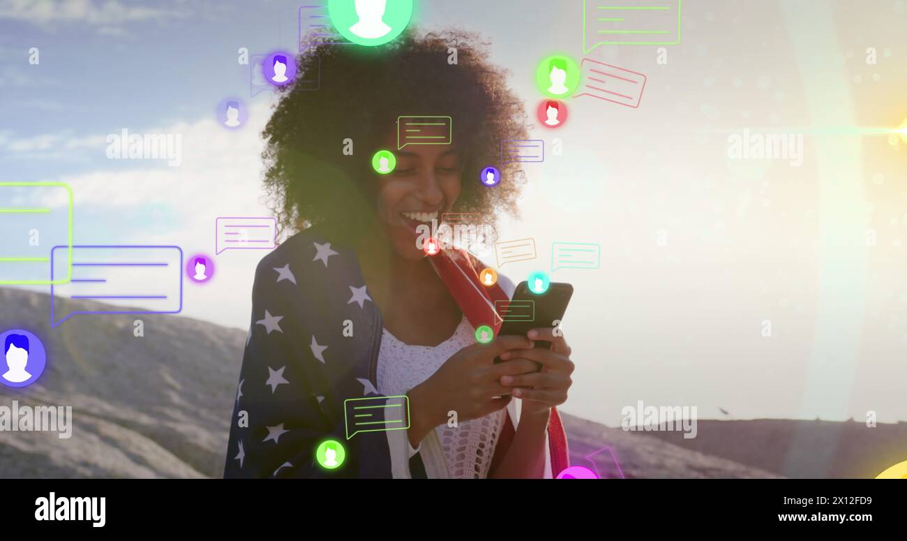 Image of media icons over happy biracial woman using smartphone Stock Photo