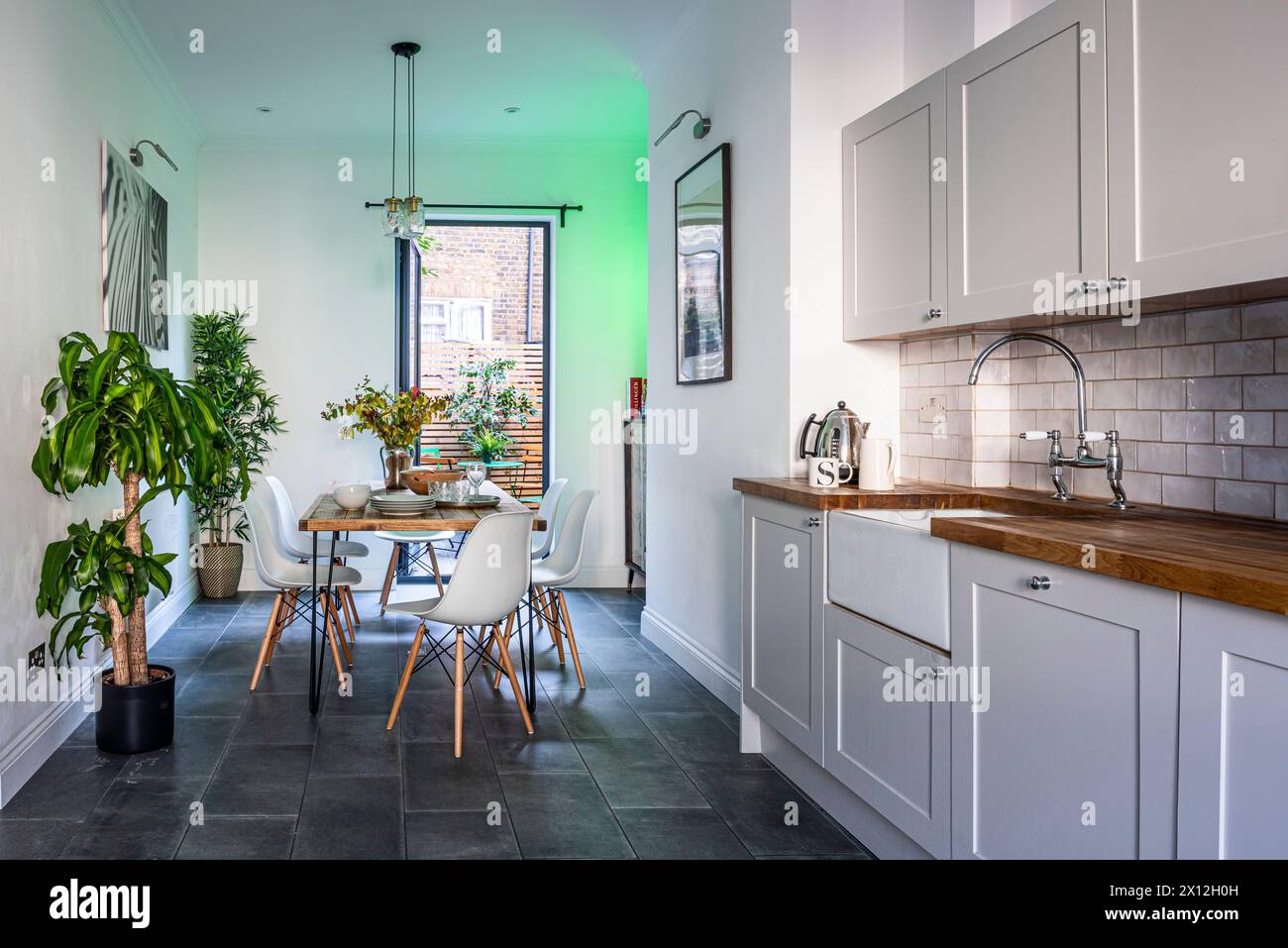 Kitchen diner with seating area in London flat, UK Stock Photo