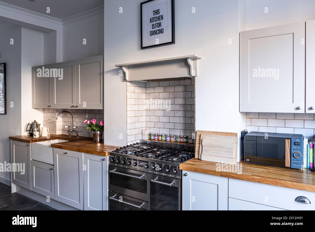 'This kitchen is for dancing' in London flat, UK Stock Photo