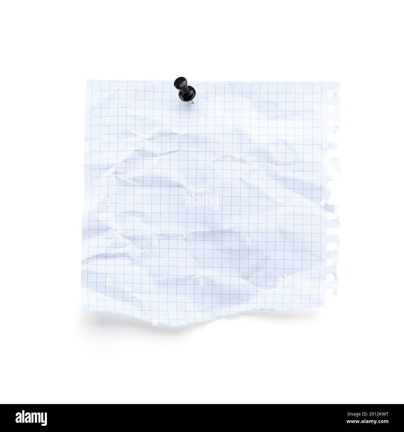 Piece of crumpled checkered notebook sheet with pin isolated on white Stock Photo
