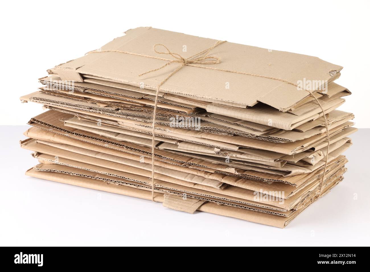 Stack of cardboard pieces isolated on white Stock Photo - Alamy