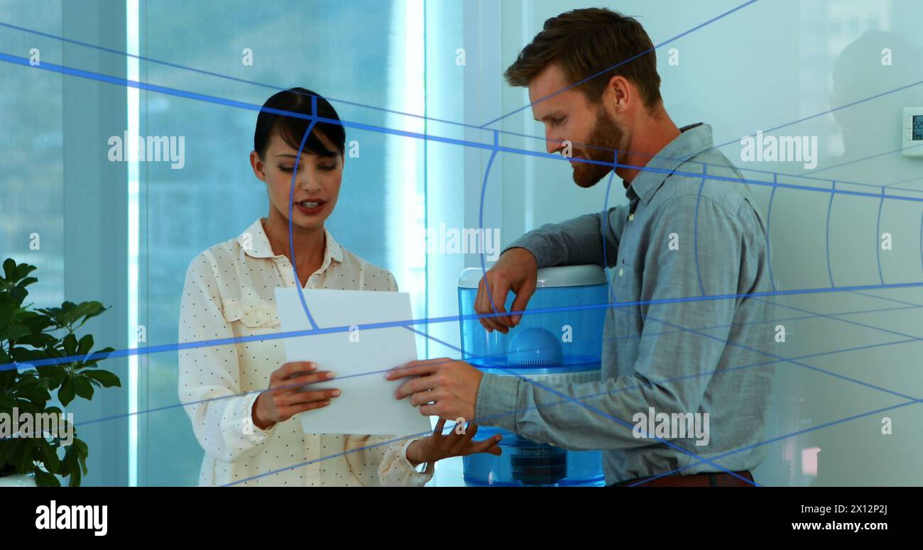 Image of shapes moving over caucasian business people in office Stock Photo