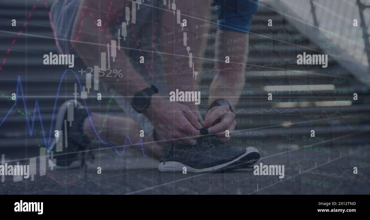 Image of graphs, changing numbers, stock market, midsection of caucasian man tying shoelace Stock Photo