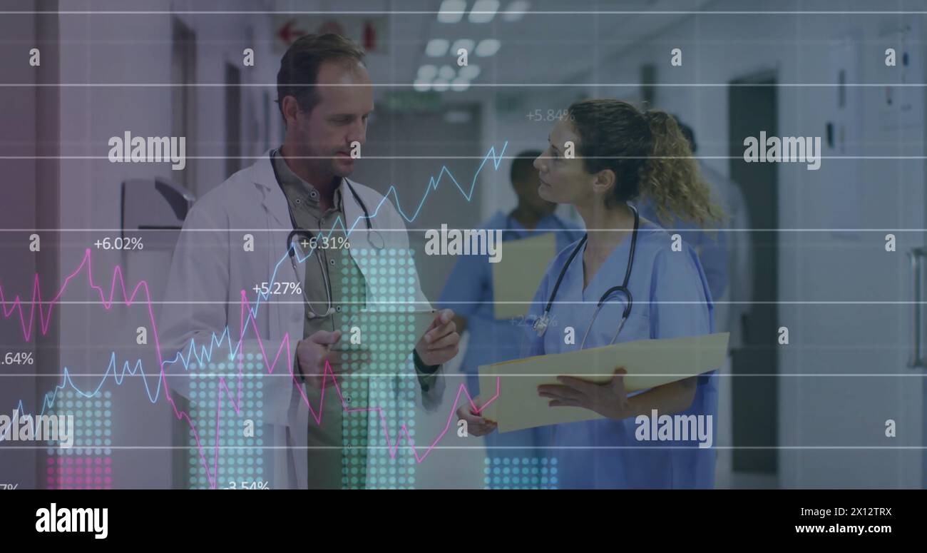 Image of graphs, changing numbers over caucasian doctor standing and