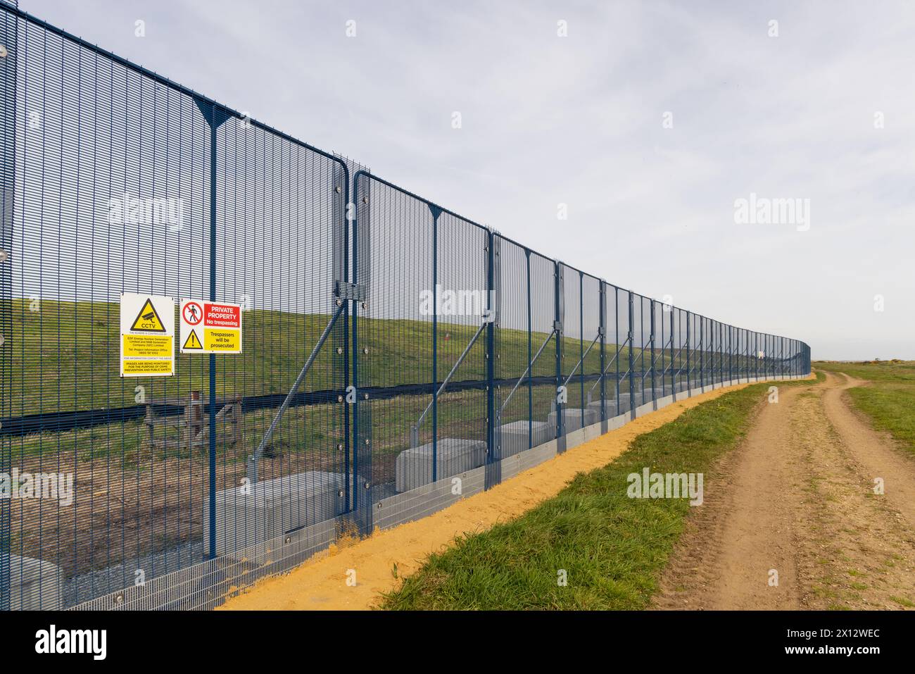 New fencing erected at the forthcoming Sizewell C nuclear power station construction site by Sizewell Beach. Suffolk. UK Stock Photo