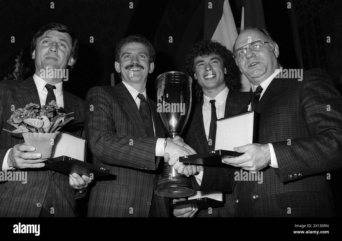 Vienna on January 28th 1987: The Austrian Football Champion Austria Wien was awarded by the City Counciller for Sports, Franz Mrkvicka. On the picture (f.l.t.r.): Trainer Otto Paretz, team captain Herbert Prohaska, Toni Polster and Franz Mrkvicka. - 19870128 PD0009 - Rechteinfo: Rights Managed (RM) Stock Photo