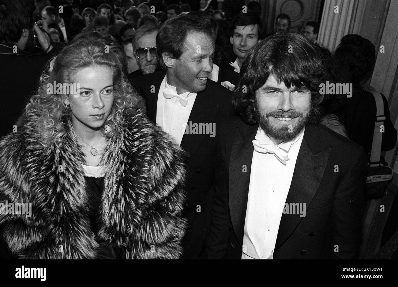 The photo taken on February 27th 1987 on the occasion of the Viennese Opernball shows extreme-alpinist Reinhold Messner and his girlfriend Sabine (background: Austrian singer Peter Kraus). - 19870227 PD0034 - Rechteinfo: Rights Managed (RM) Stock Photo