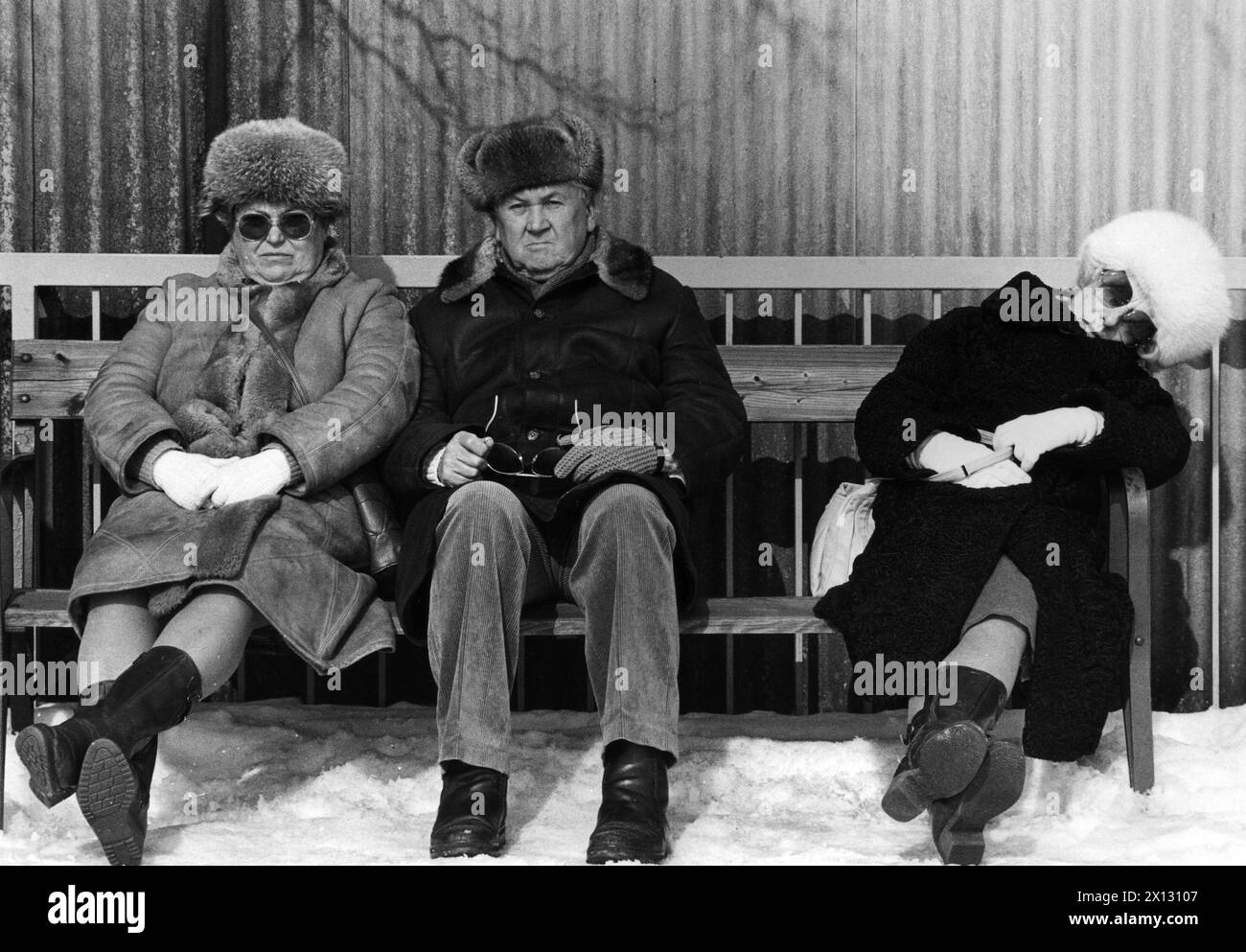 The photo of March 12th 1987 shows elderly people enjoying the sun in Winter time on a Viennese bench. Covered with warm fur coats and hats, these people might dream of a warm holiday down south. - 19870312 PD0001 - Rechteinfo: Rights Managed (RM) Stock Photo