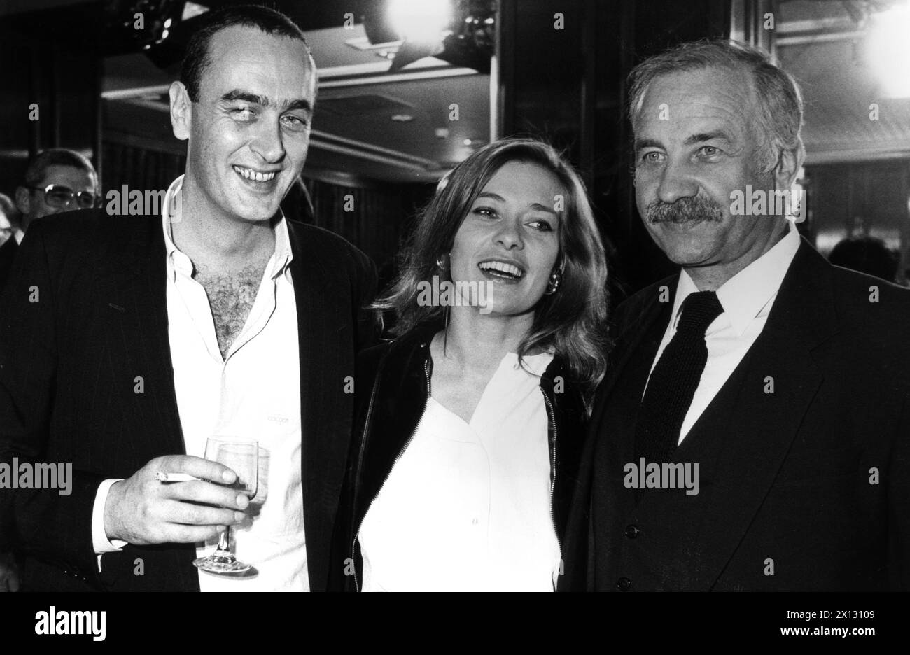 The photo was taken on March 27th 1987 on the occasion of the opening of the cinematic festival Viennale and shows (f.l.t.r.) the successfull German Producer Bernd Eichinger, actress Barbara Rudnik and actor Armin Mueller-Stahl. - 19870327 PD0019 - Rechteinfo: Rights Managed (RM) Stock Photo