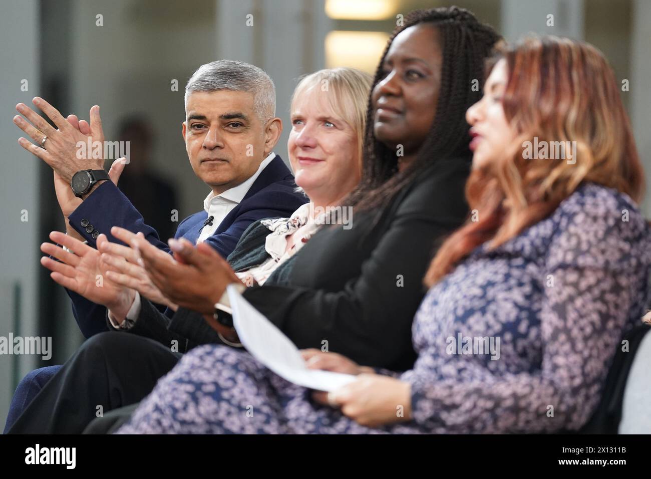 Mayor of London Sadiq Khan waits to make his speech during a visit to St John's Church in Waterloo, south London, as he has pledged to wipe out rough sleeping in the capital by 2030 if he is re-elected as London mayor on May 2. Some £10 million - the biggest single intervention to tackle rough sleeping from City Hall on record - would be used to fund an expanded network of 'ending homelessness hubs' under the plans. The hubs are designed to help an extra 1,700 rough sleepers every year with rapid reassessment and rehousing. Picture date: Monday April 15, 2024. Stock Photo