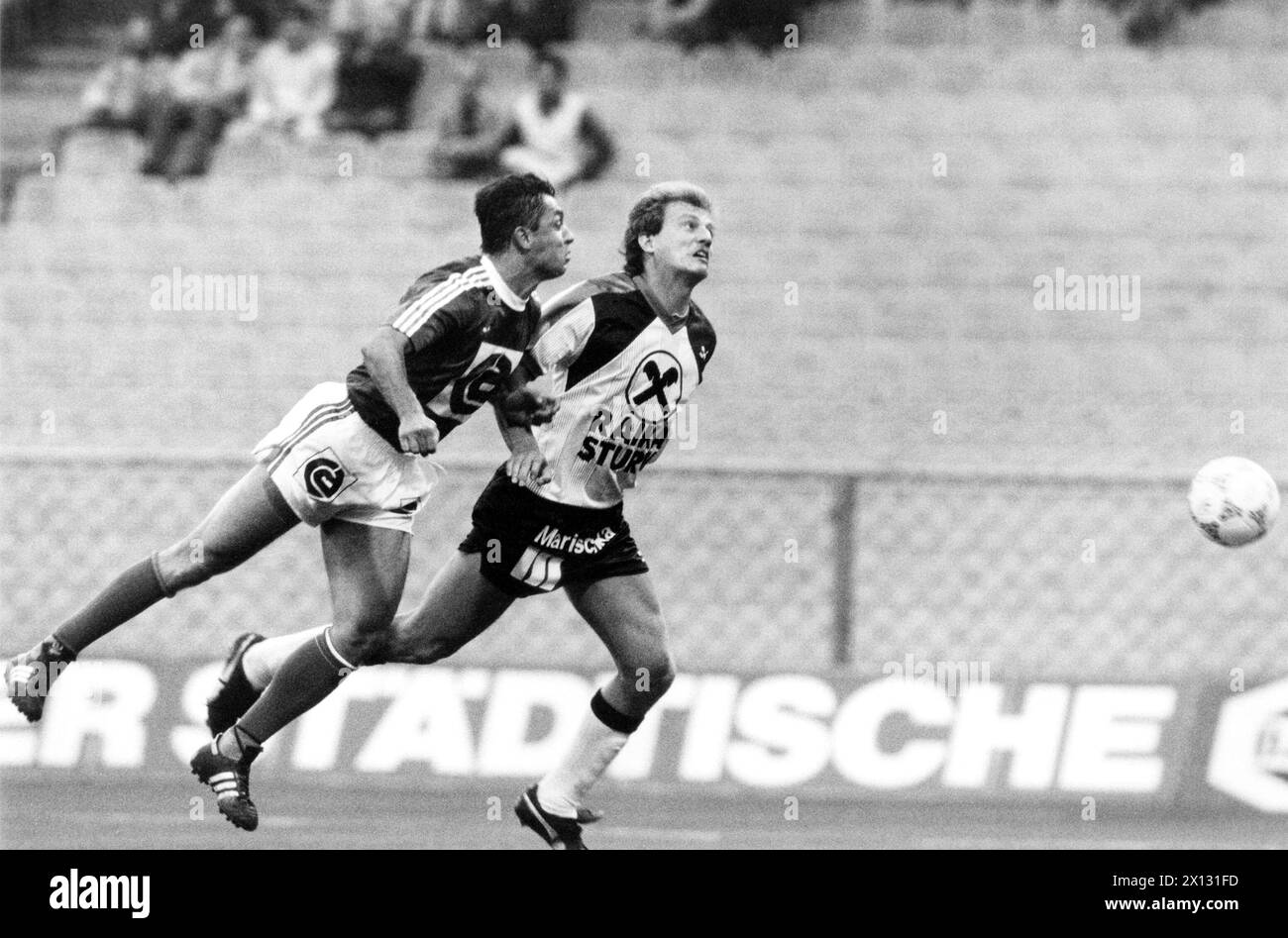 The photo was taken on August 7th 1987 on the occasion of the football match Rapid Vienna vs. Sturm Graz and shows a duel between Zlatko Kranjcar (l.) and Rudolf Schnauss (r.). - 19870807 PD0002 - Rechteinfo: Rights Managed (RM) Stock Photo