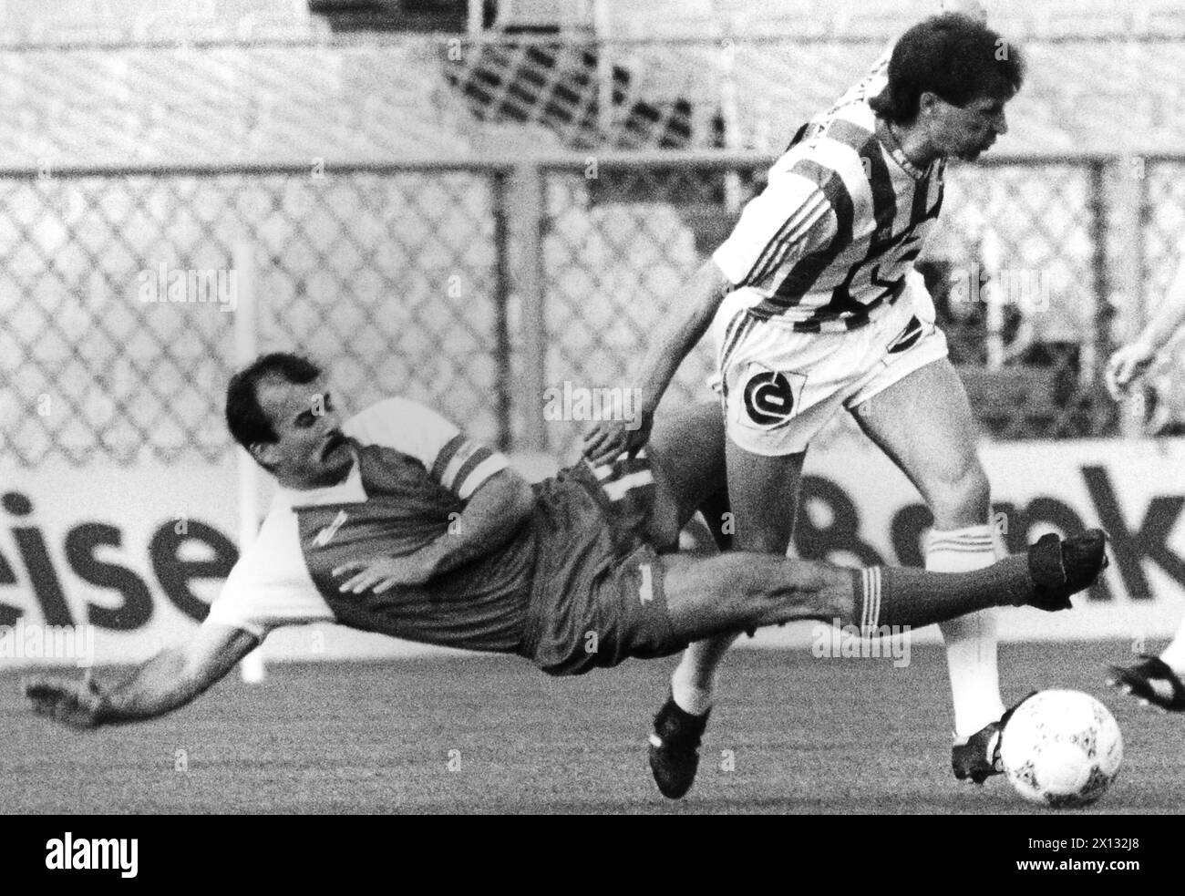 Football League master play-off between Rapid and the Sportklub in Vienna's Hanappi Stadium on May 6th 1988. In the picture: Sportklub captain Peter Muellner (l.) and Suleiman Halilovic (r., Rapid). - 19880506 PD0012 - Rechteinfo: Rights Managed (RM) Stock Photo
