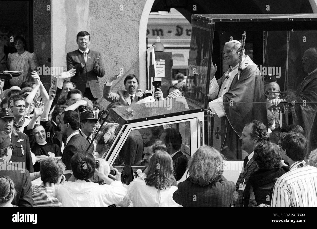 The photo was taken on June 26th 1988 on the occasion of Pope John Paul's II visit in Austria and shows Pope John Paul II driving through the mass in the 'Papamobil'. - 19880626 PD0009 - Rechteinfo: Rights Managed (RM) Stock Photo