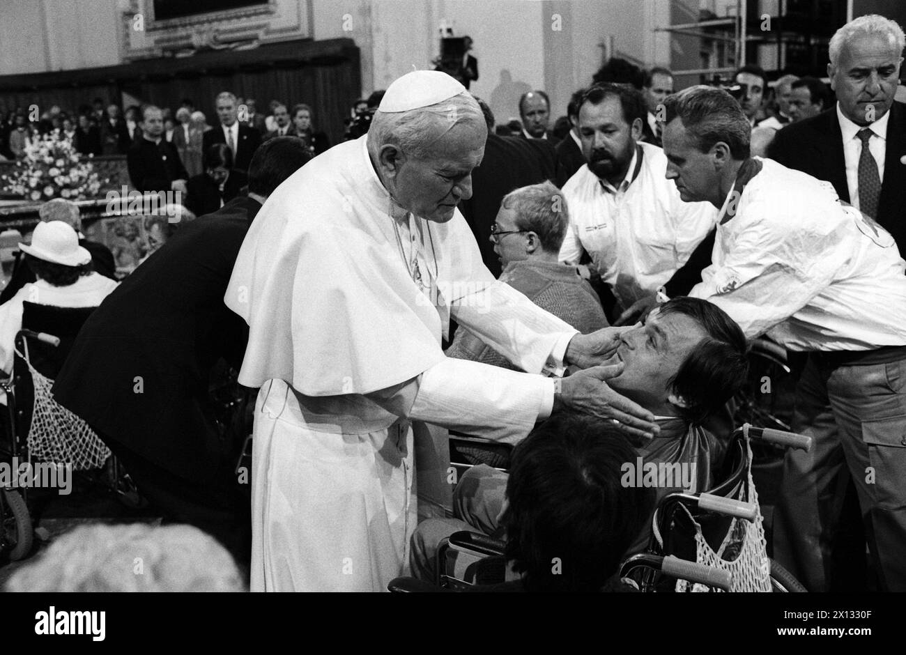 The photo was taken on June 26th 1988 on the occasion of Pope John Paul's II visit in Austria and shows the Pope John Paul at a meeting with handicapped and elderly people in the basilica of Salzburg. - 19880626 PD0011 - Rechteinfo: Rights Managed (RM) Stock Photo