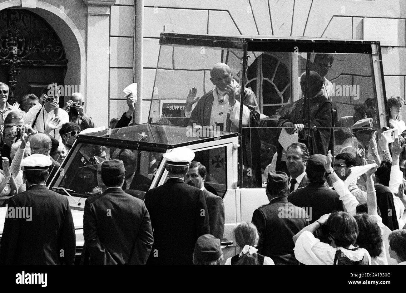 The photo was taken on June 26th 1988 on the occasion of Pope John Paul's II visit in Austria and shows Pope John Paul II driving through the mass in the 'Papamobil'. - 19880626 PD0008 - Rechteinfo: Rights Managed (RM) Stock Photo