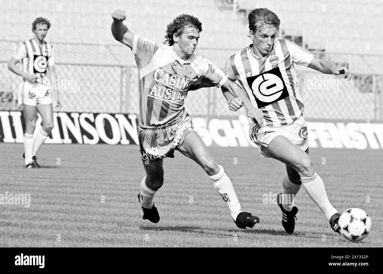 Football match between Rapid and Admira Wacker (1:2) in Vienna's Hanappi Stadium on August 13th 1988. On the picture: Peter Artner (Admira, l.) and Andreas Herzog (Rapid). - 19880813 PD0003 - Rechteinfo: Rights Managed (RM) Stock Photo